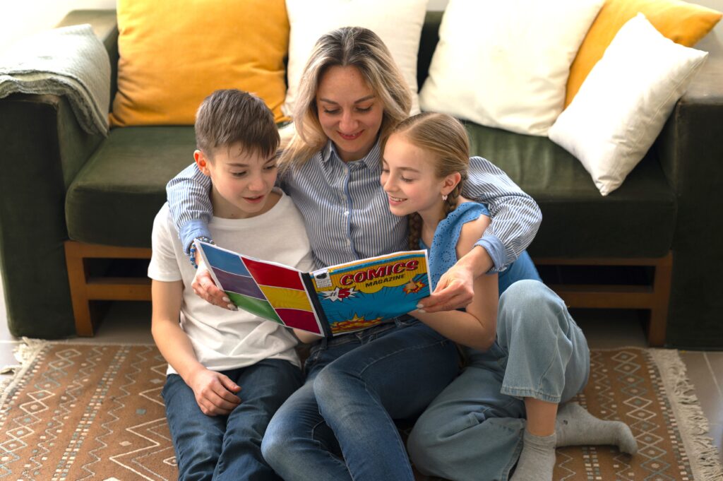 Mother and children reading a comics book